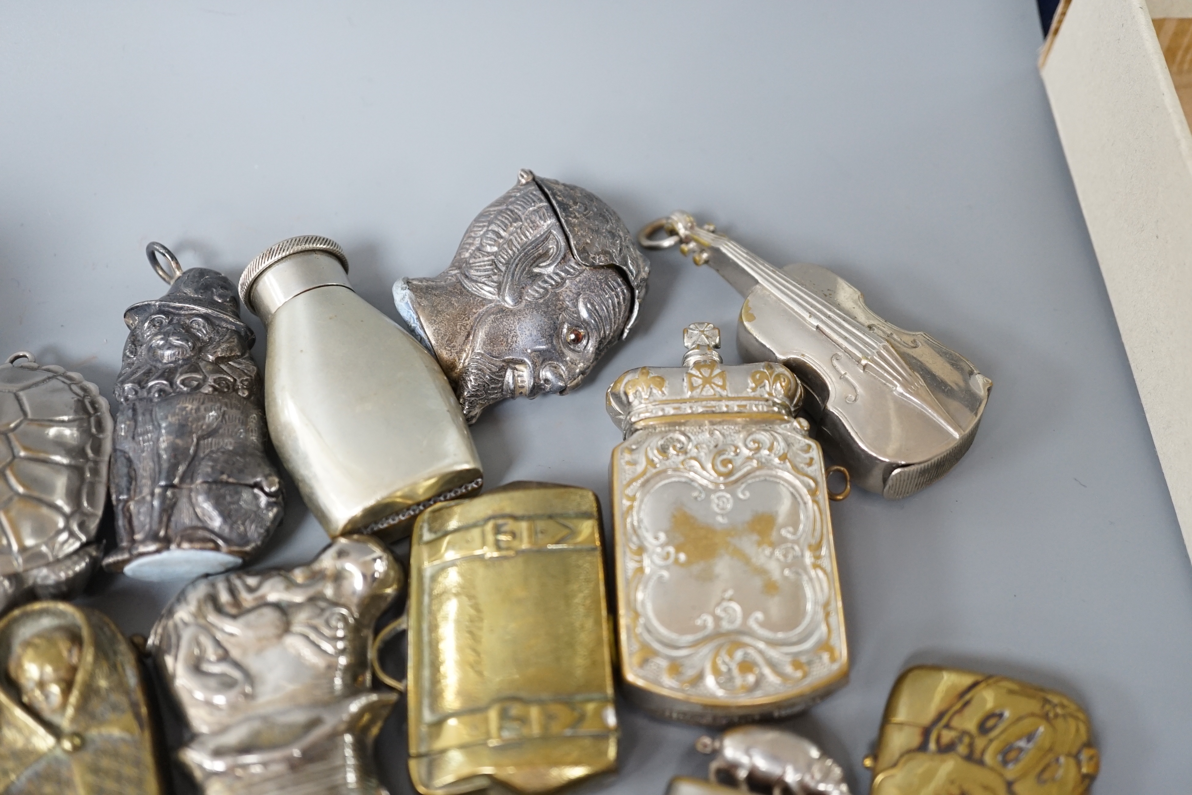 A collection of mostly 20th century novelty vestas